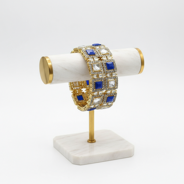 Pair of Gold-Plated Bangles Adorned with Blue and White Stones