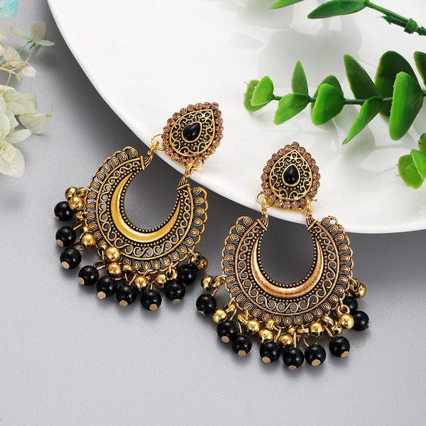 Lunar Beauty: Gold Crescent Earrings with Black Bead Details