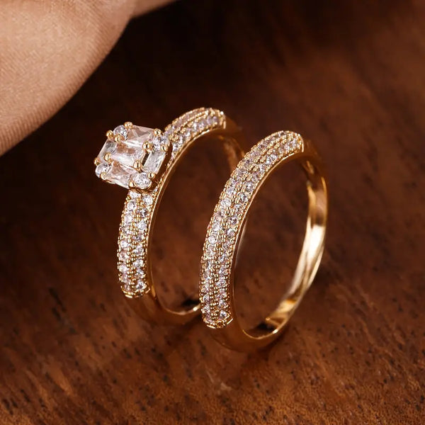 2 pc. Set of Golden Rings Adorned with Multiple Small Gemstones.