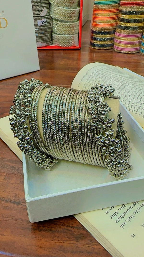 Intricate Silver Bangle Set with Bell Charms