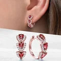Teardrop-shaped synthetic gemstone Golden earrings