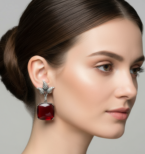 Artistic Flair: Designer Leaf Earrings with Red Stone